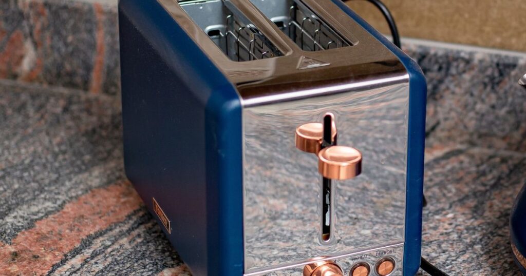 BELLA Fits-Anywhere Slim Toaster: Smart Things to Consider Before Buying 7 BELLA Fits-Anywhere Slim Toaster with four-slice capacity and extra-long, wide slots on a kitchen countertop.